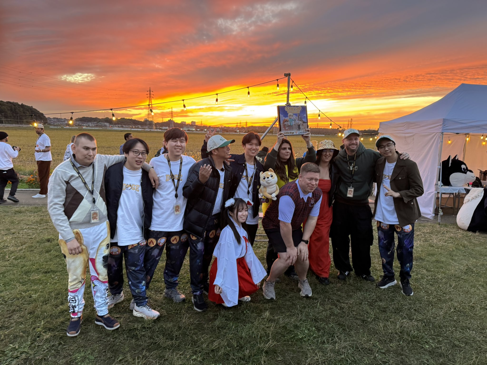 Outdoor community celebration at sunset in Japan